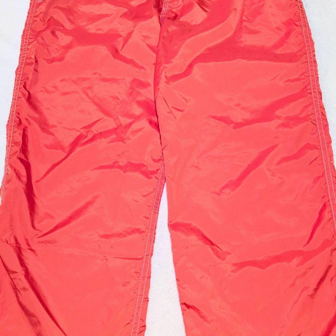 【rough & swell】ナイロン ゴルフパンツ ウエスト調整 オレンジ L