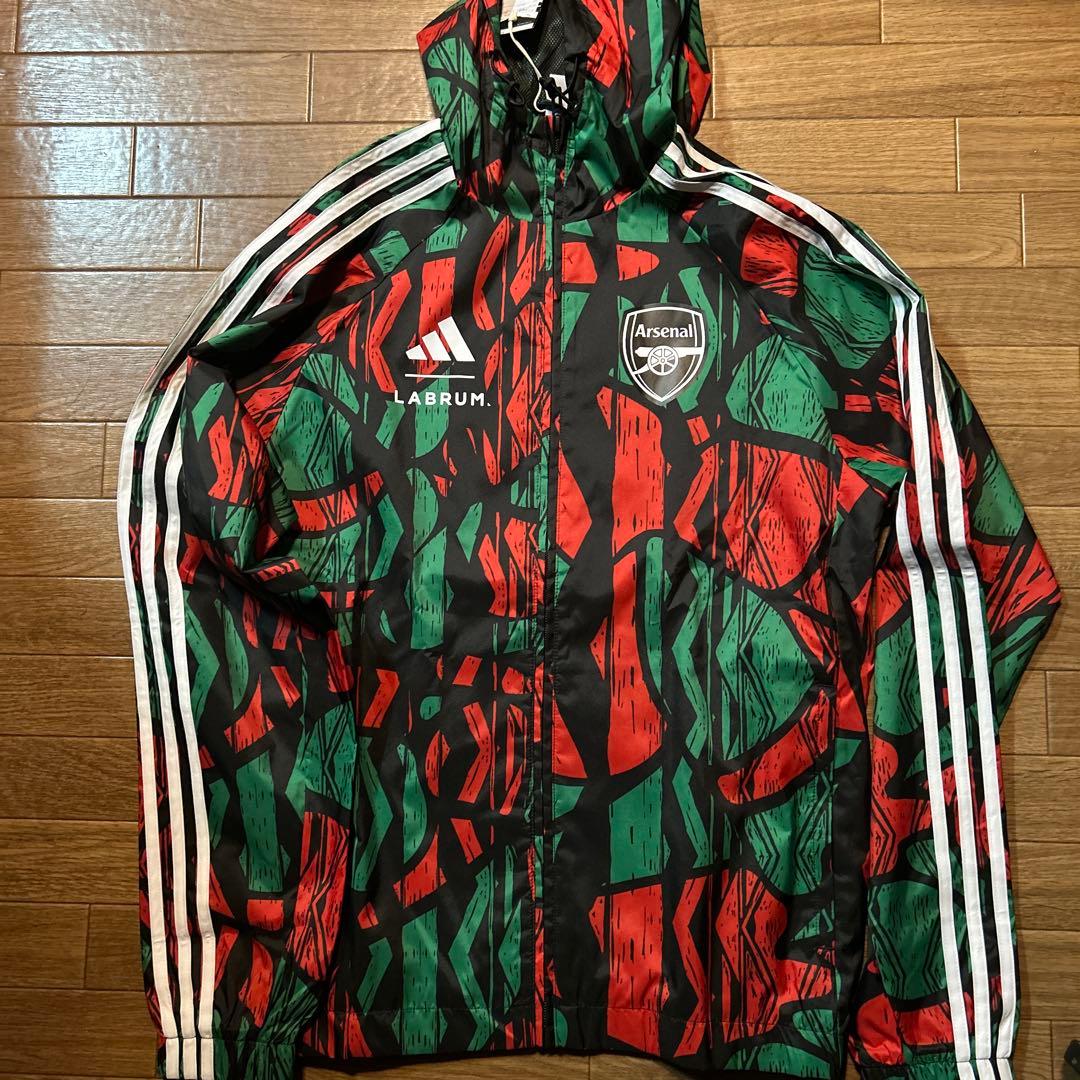 アディダス　アーセナル × LABRUM シーズナル ウインドブレーカー