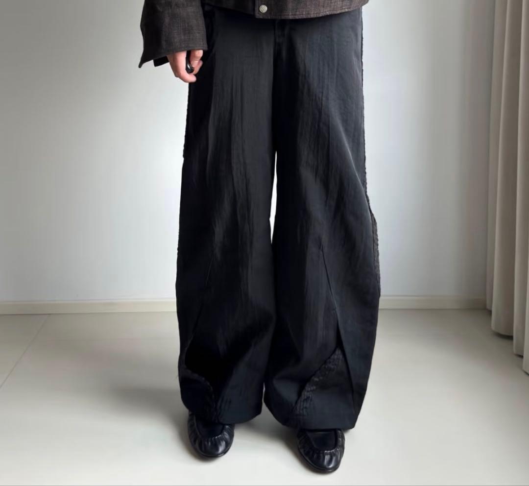 NULLUS ヌルース 25ss INTERTWINED TROUSERS 黒
