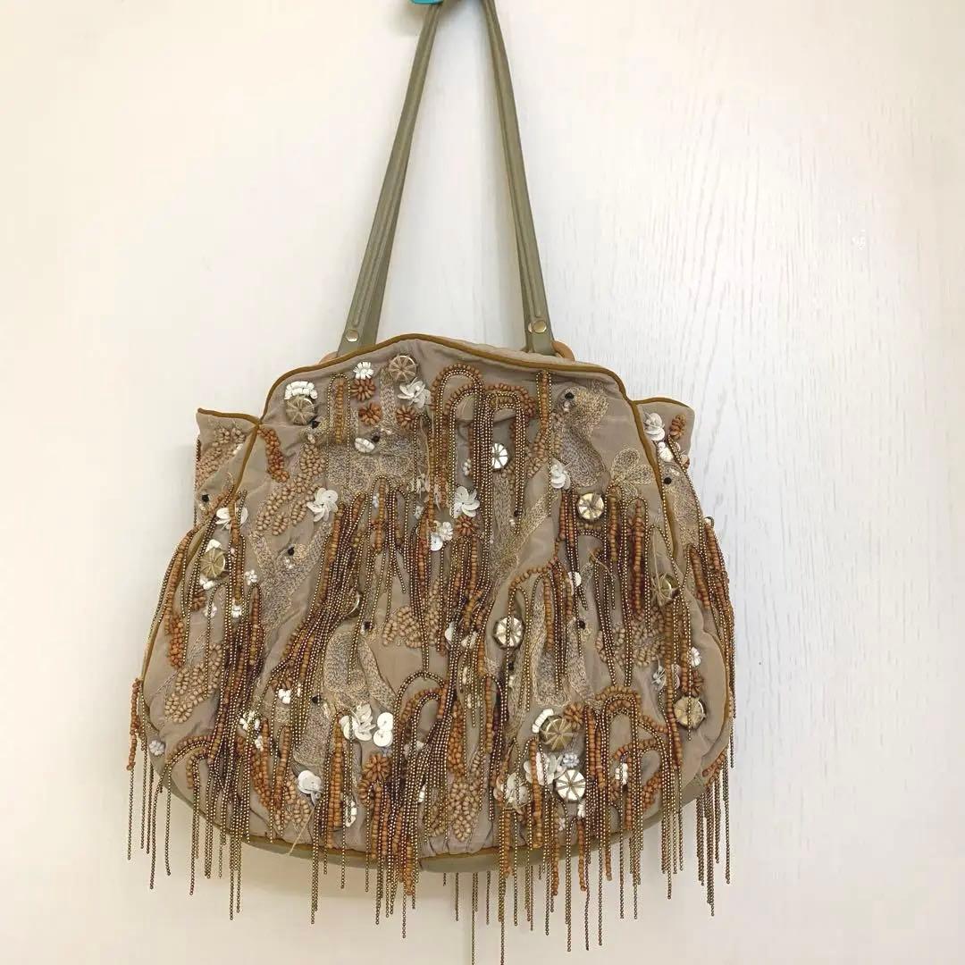 お値下げ中‼️JAMIN PUECH ベージュ ビーズお猿さん装飾 バッグ